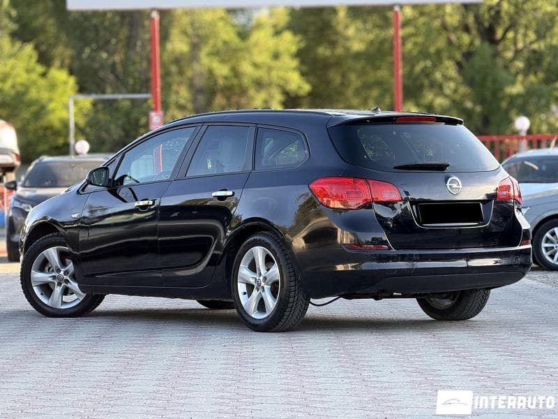 Opel Astra 2011 — Миниатюра 3