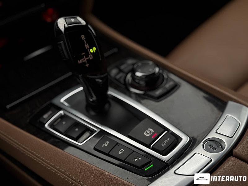 BMW 740 2011 — Миниатюра 12